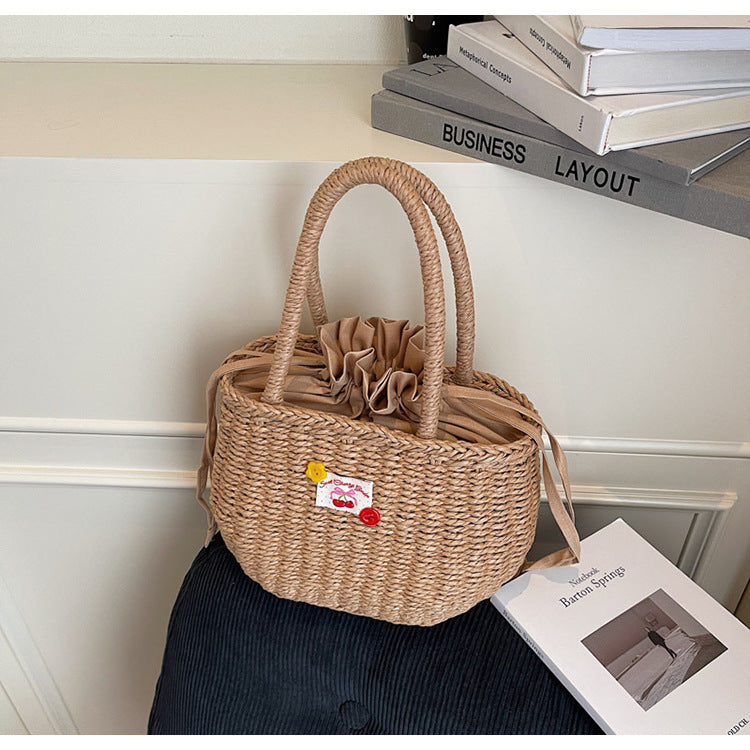 Hand-Woven Straw Beach Bag – Holiday Drawstring Casual Handbag for Women