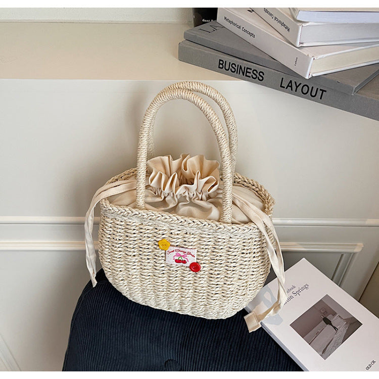 Hand-Woven Straw Beach Bag – Holiday Drawstring Casual Handbag for Women